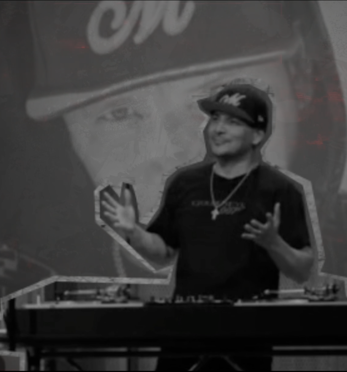 Mix Master Mike behind the turntables on stage
